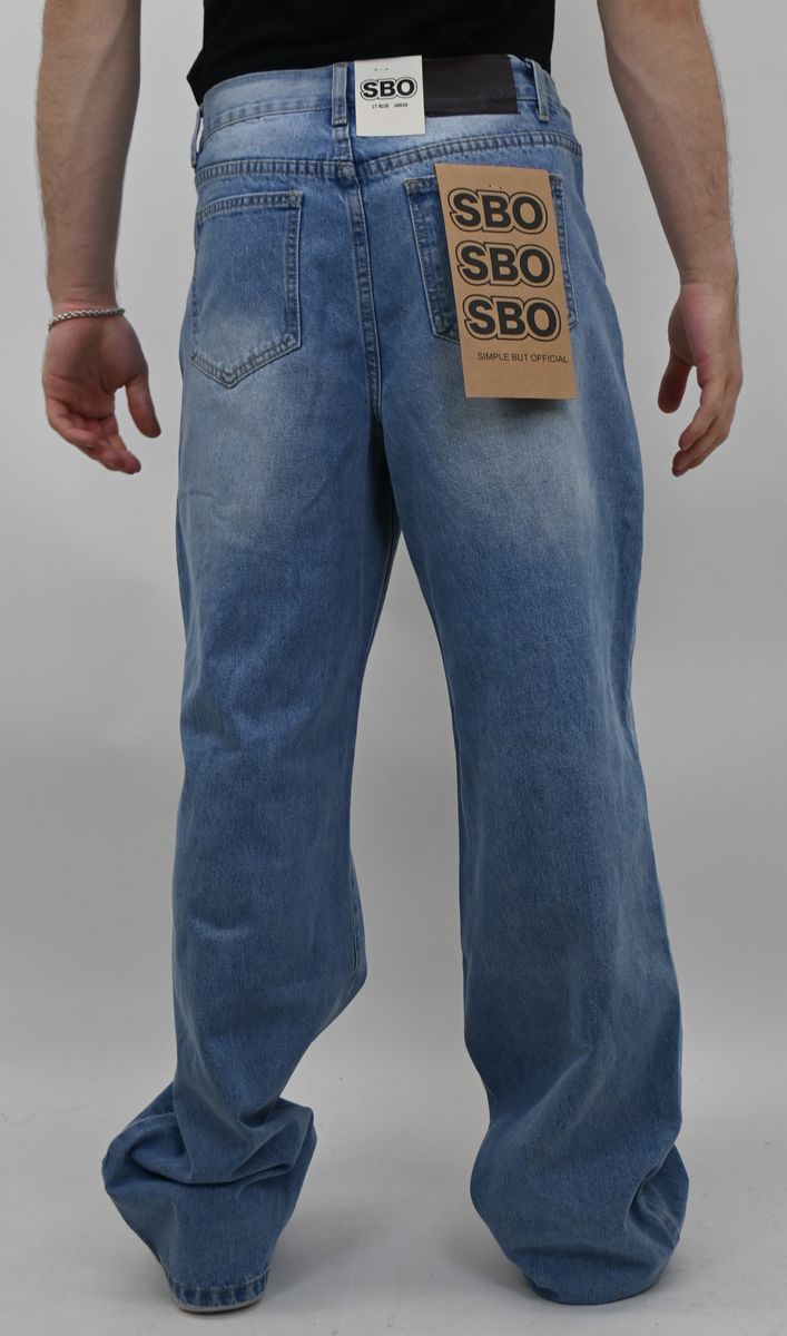 LIGHT BLUE RIPPED BAGGY JEANS