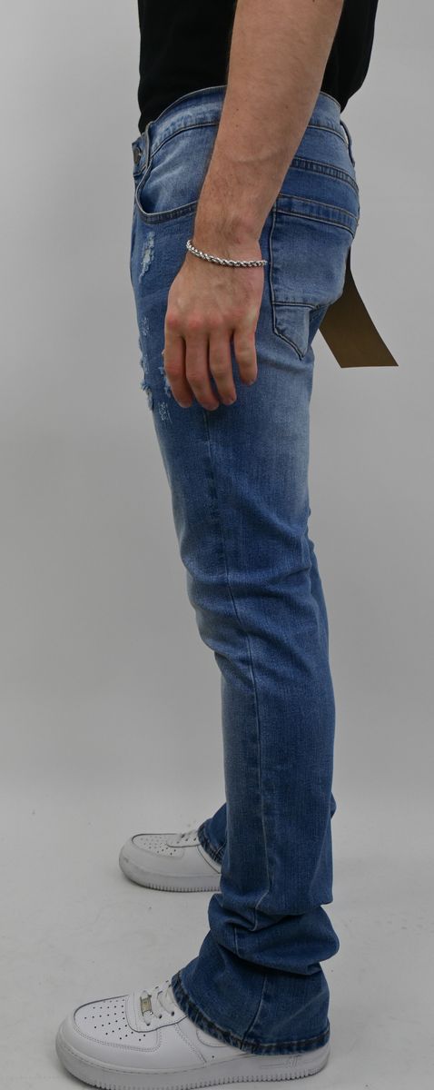 LIGHT BLUE STACKED JEANS WITH RIP AND TEAR
