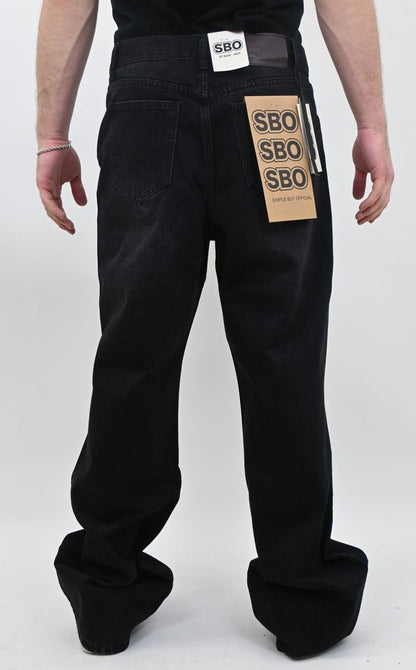 JET BLACK RIPPED BAGGY JEANS
