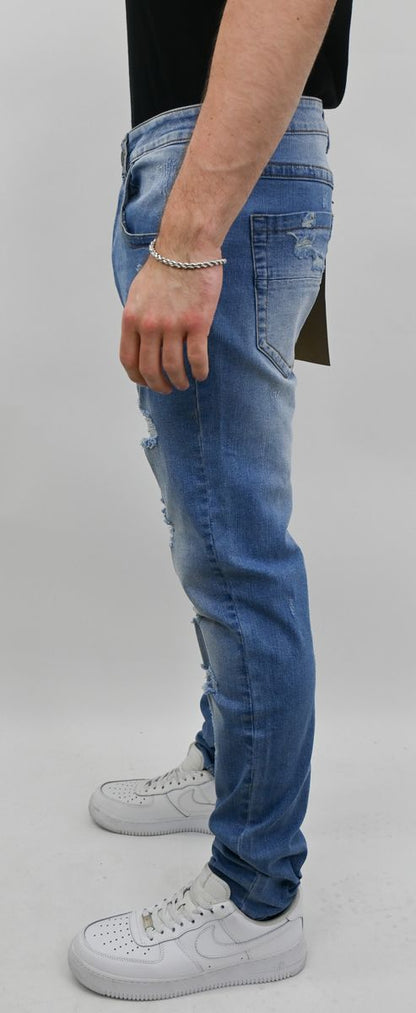 LIGHT BLUE RIPPED SKINNY JEANS