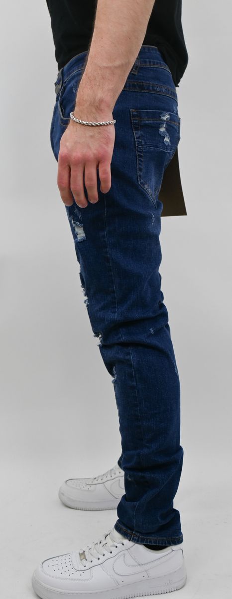 MID BLUE RIPPED SKINNY JEANS